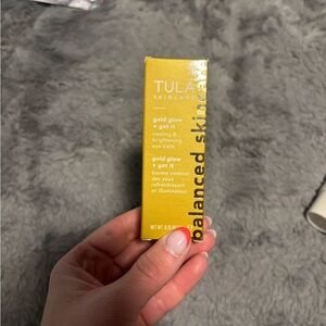 Tula Gold Glow Cooling & Brightening Eye Balm — Bright Yellow Packaging